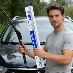 KAIYI blades clearing heavy rain on a windshield for safer nighttime driving