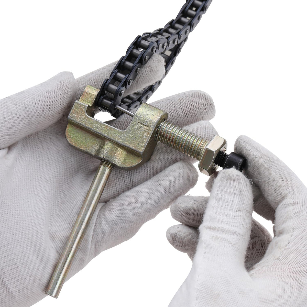 KAMIER chain beside a ruler to show scale and 116-link length for fit confirmation