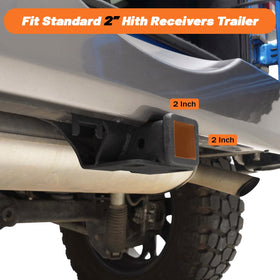 KANGIKX lifestyle shot of Jeep towing trailer conveys ready-for-adventure strength