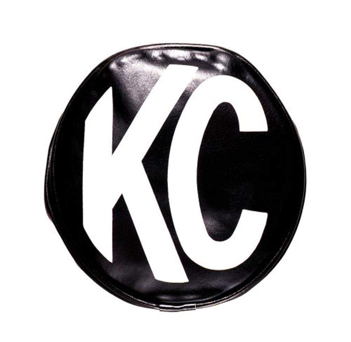 KC 6" black vinyl cover front view protecting lens and showing white logo