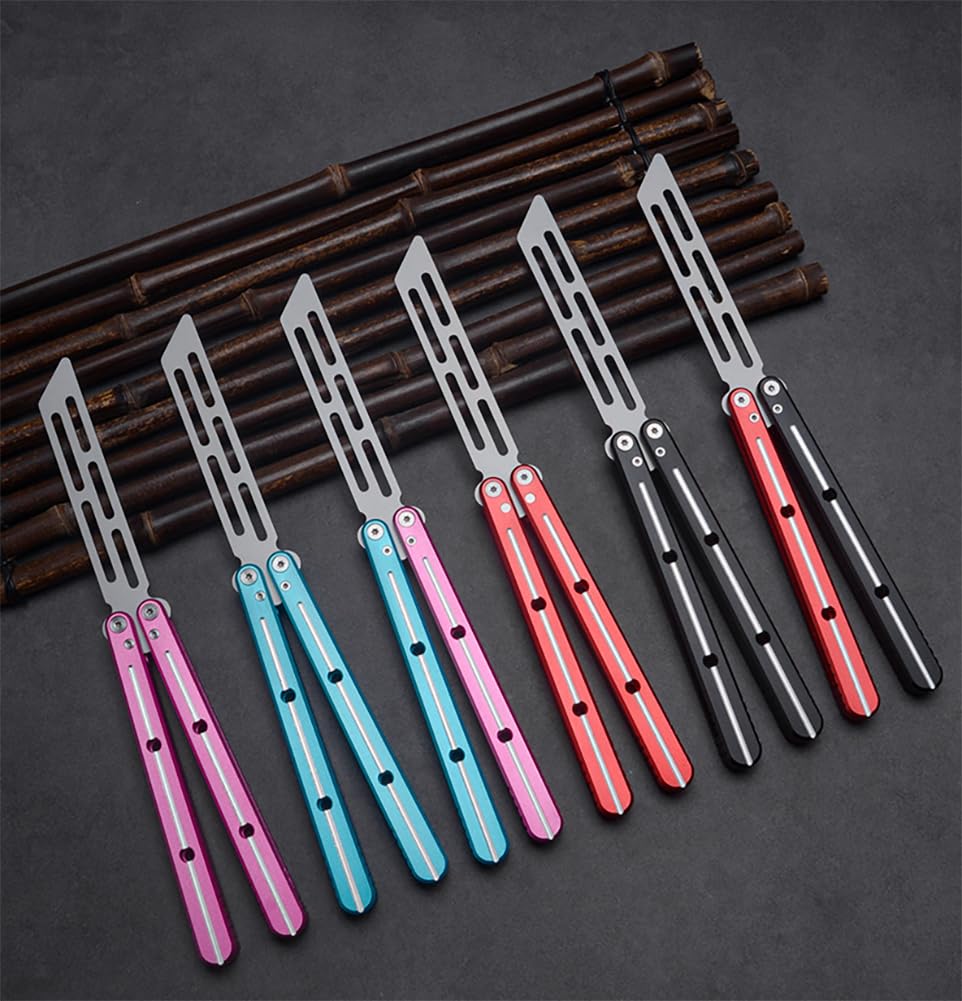 KEEDAS held in hand for scale showing compact length and comfortable control