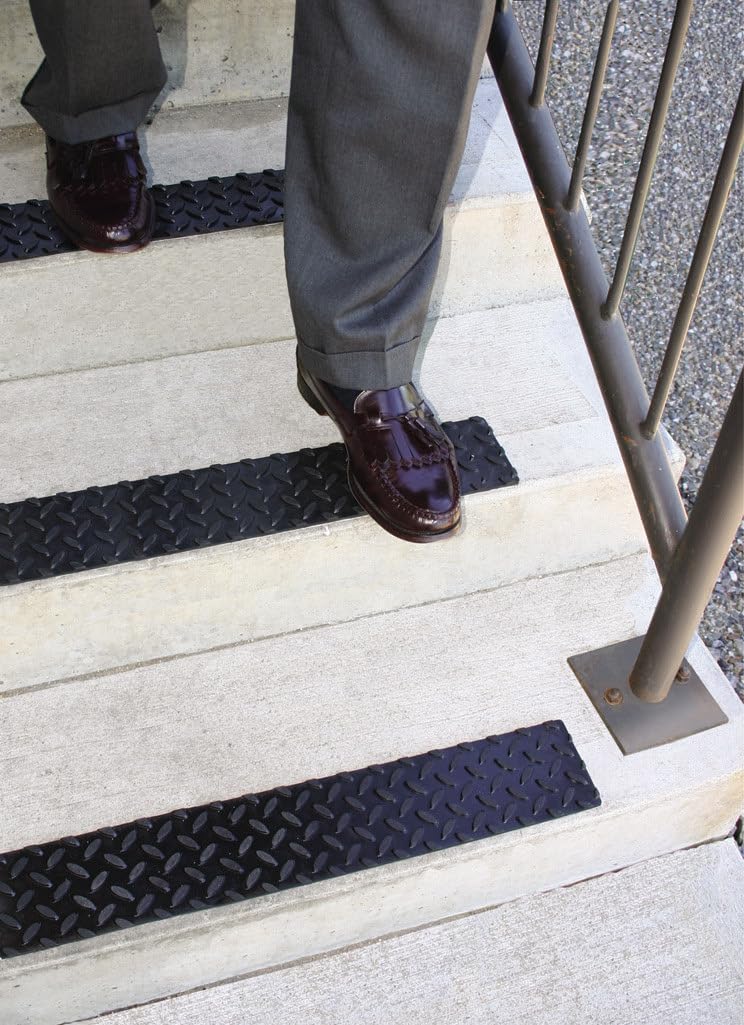 KEEPER scale comparison on a stair step showing 4 by 17.5 inch fit advantage