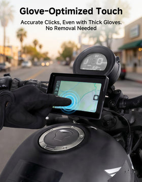 KEMIMOTO display operated by gloved hand highlighting safe on-ride interactions
