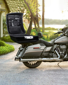 KEMIMOTO lifestyle shot with organizer in a parked touring bike trunk for practical use