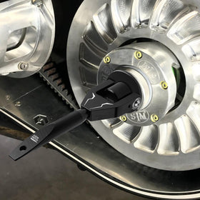 KEMIMOTO in use removing belt from Maverick demonstrating fast service