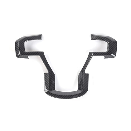 Keptrim front view of steering wheel cover showing sleek carbon fiber look and protection
