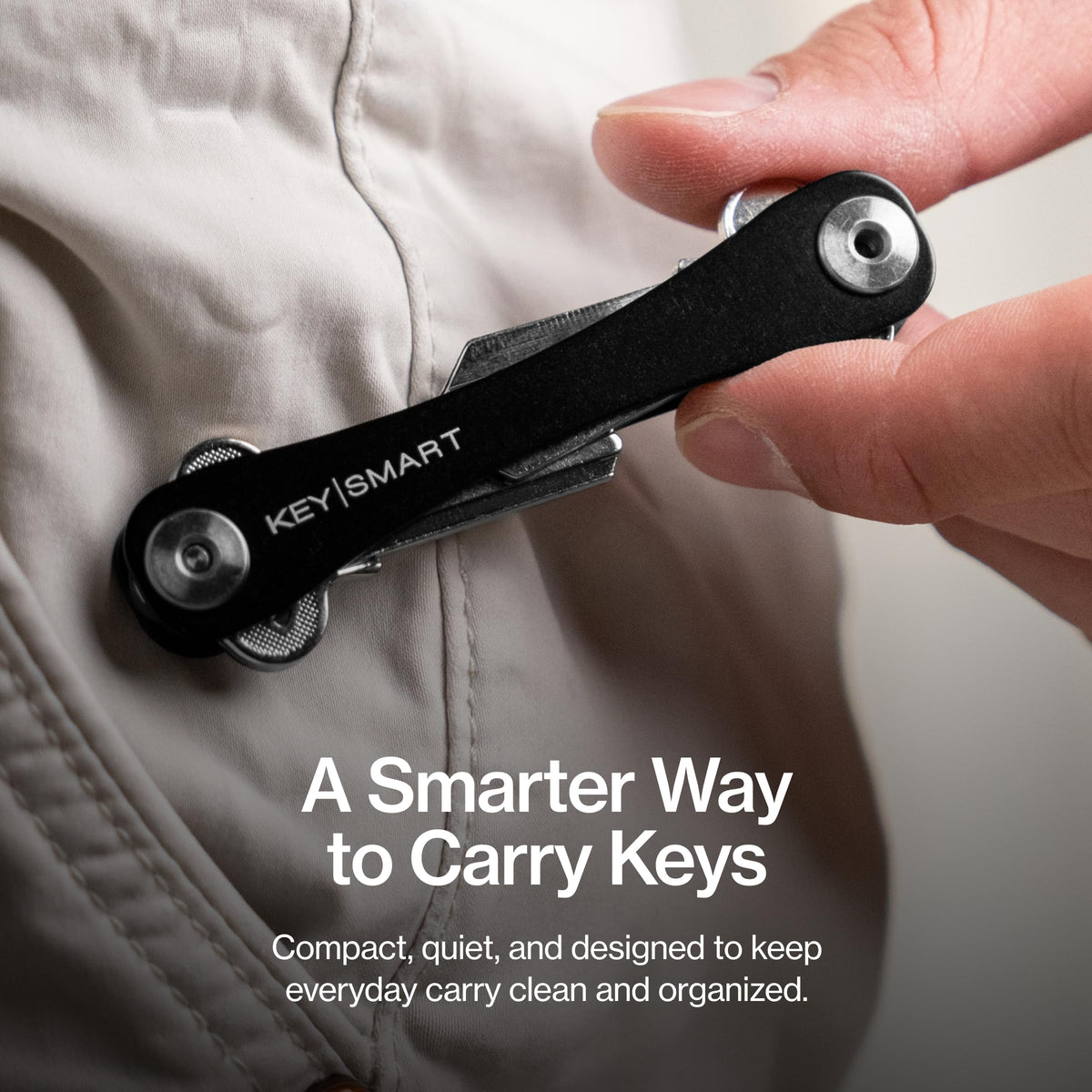 KeySmart retail packaging and inserts showing included components