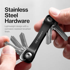 KeySmart next to wallet to show pocket-friendly scale and convenience