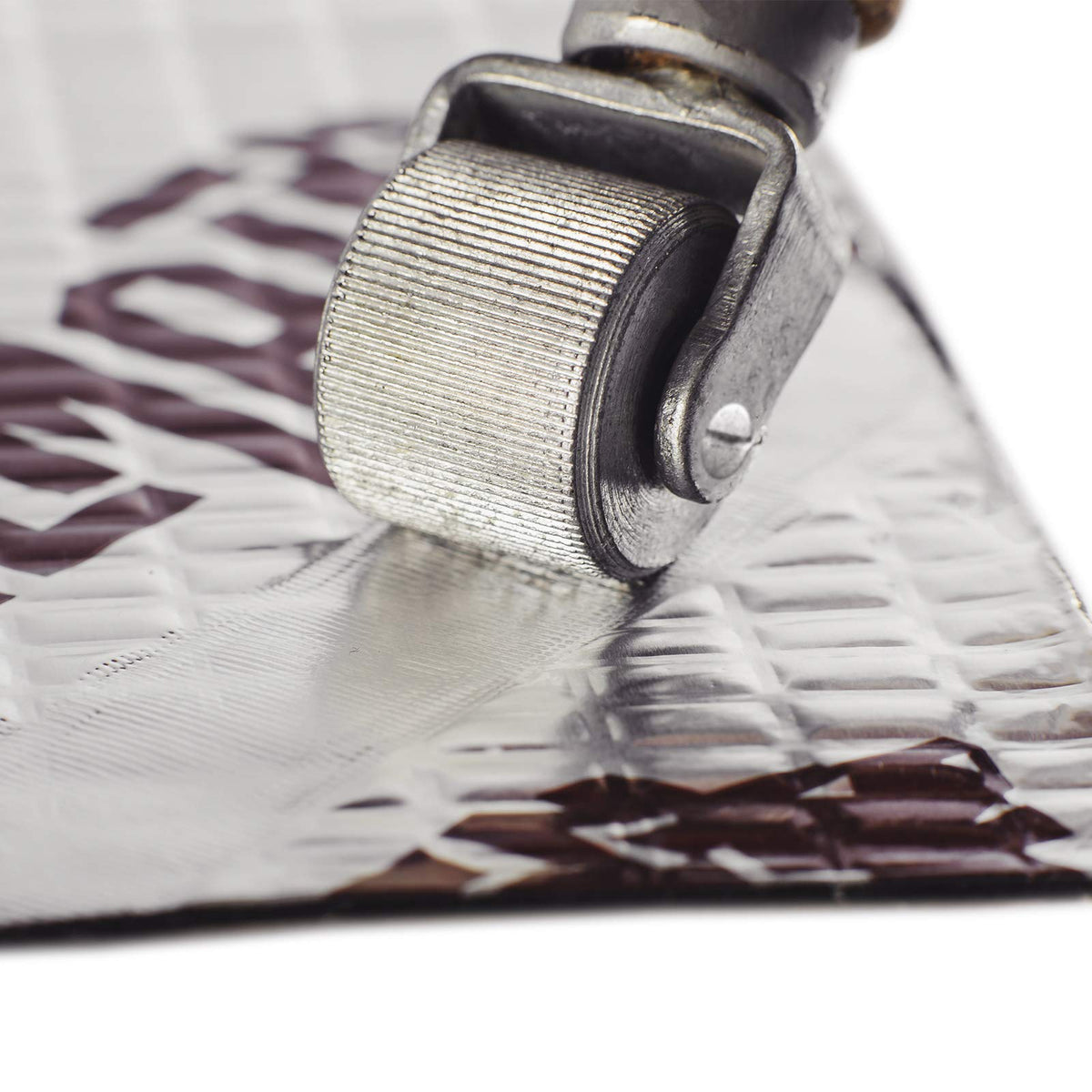KILMAT laid out on floor with ruler to show coverage and scale benefit