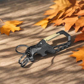 Kivssi clipped to a bag strap illustrating hands-free carry and quick access benefit
