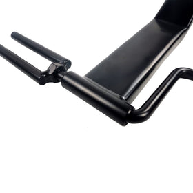 KJE holding a neatly rolled 4-inch strap illustrating organized storage benefit