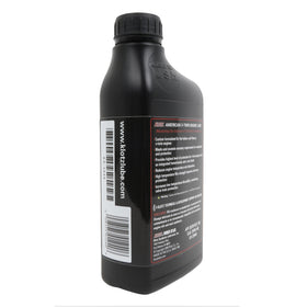Pouring Klotz oil into Indian Thunderstroke engine during service for optimal lubrication