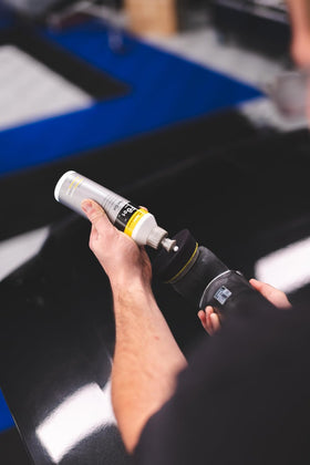 KOCHCHEMIE residue being wiped off with a microfiber for clean finish ready for sealing