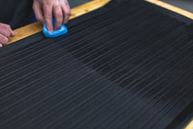 KOCHCHEMIE Gummifix before and after on a door seal showing restored clean rubber