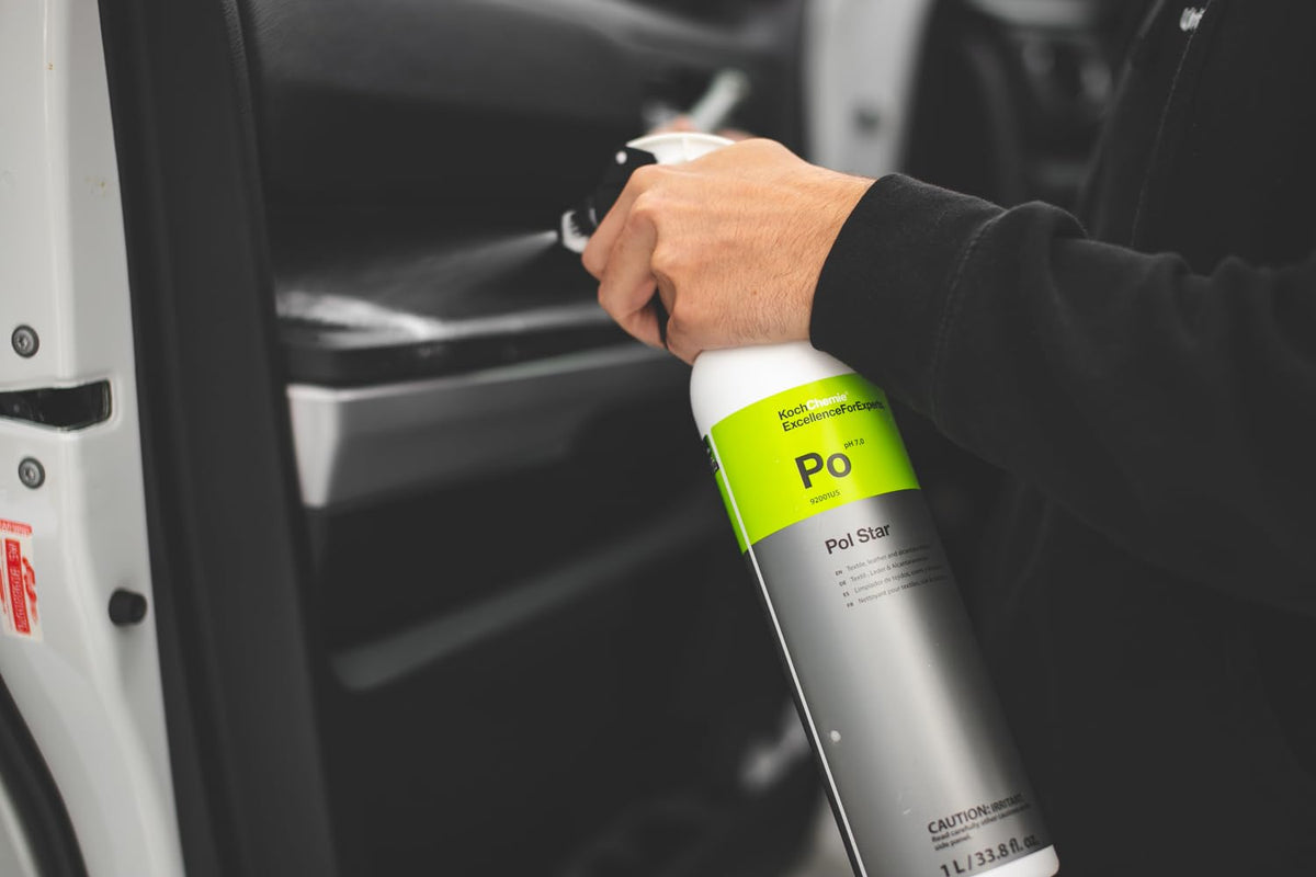 KOCHCHEMIE spray application on seat fabric for targeted cleaning
