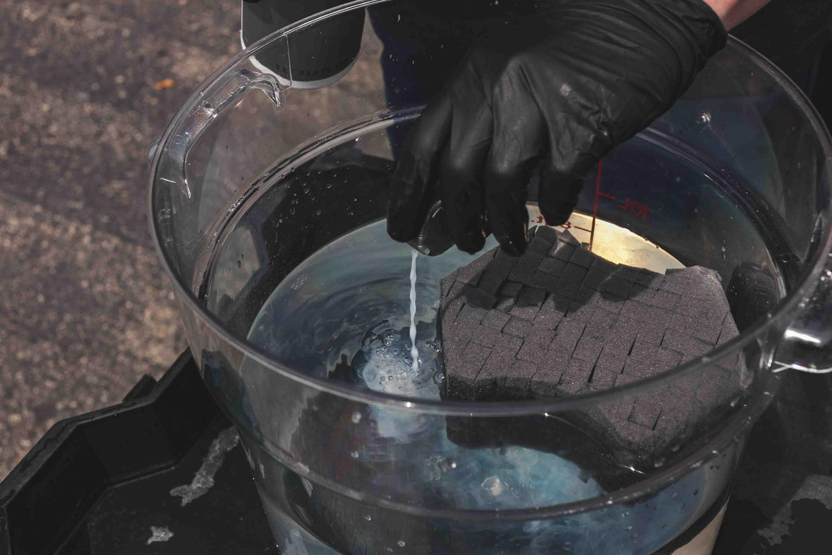 KOCHCHEMIE being sprayed and wiped off illustrating safe use on coatings and wraps