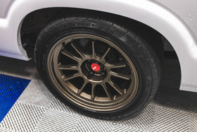 Textured plastic trim treated with KOCHCHEMIE highlighting renewed color and protection