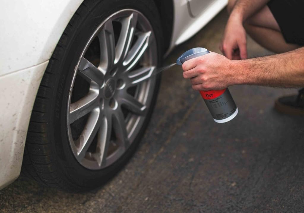 KOCHCHEMIE cleaner sprayed on wheel demonstrating effective stain removal