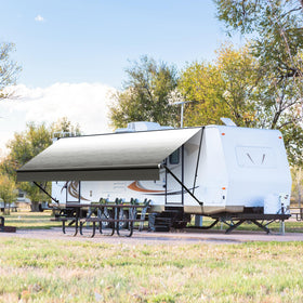 Kohree awning set up at campsite providing shade and enhancing outdoor comfort