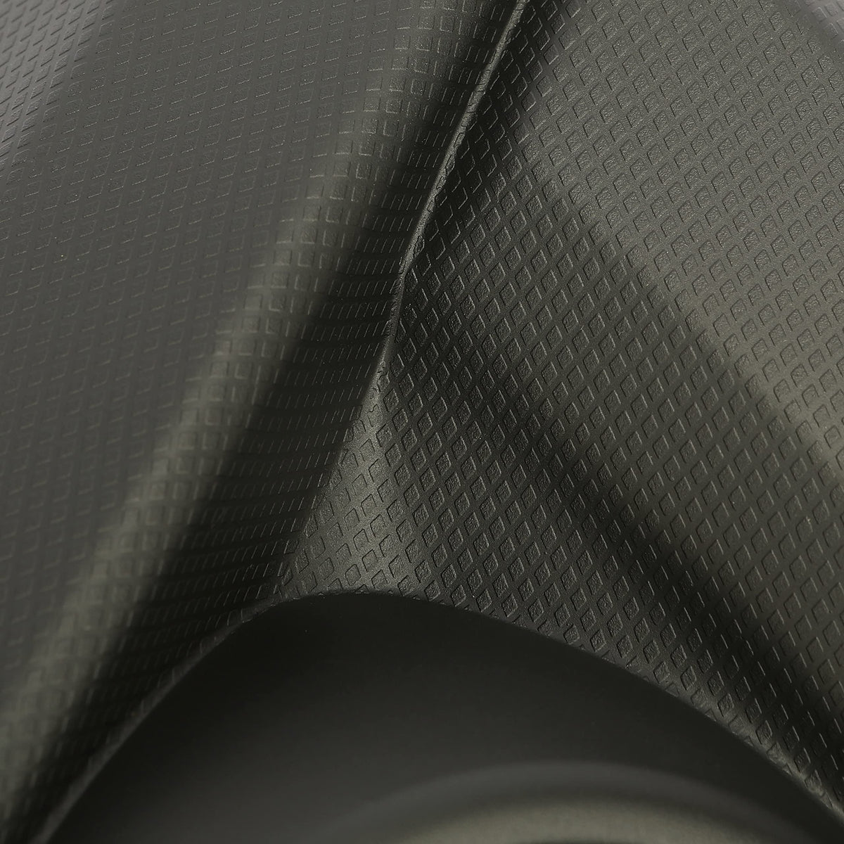 Kojem bezel on vehicle in driveway giving a realistic lifestyle context