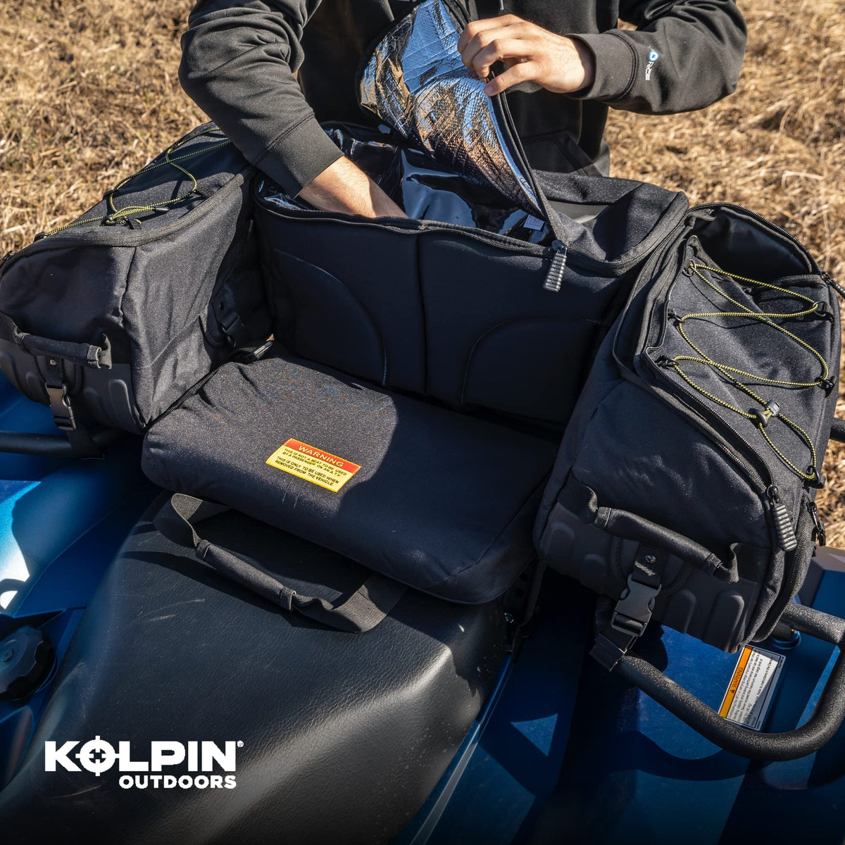 Kolpin Matrix Seat Bag attached on ATV illustrating secure mounting benefit