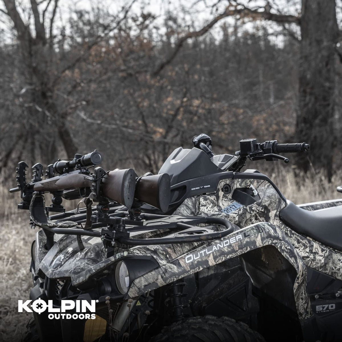 Kolpin Rhino XL beside a ruler showing compact dimensions and easy fit