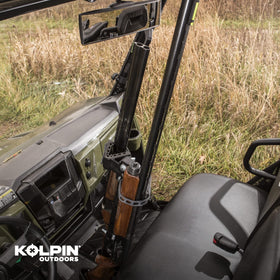 Kolpin UTV gun rack mounted in UTV floor for stable firearm transport