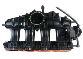 Koomaha intake manifold installed in engine bay demonstrating direct-fit restoration