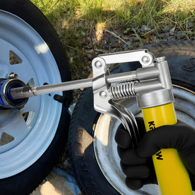 KRETLAW 4‑jaw reinforced coupler detail showing secure fit for safer grease application