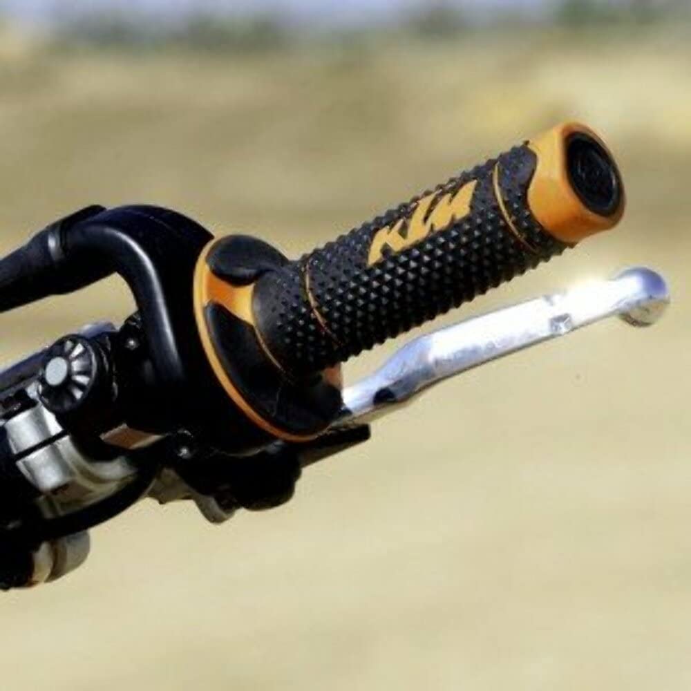 KTM grips on off-road bike in trail setting illustrating durability benefit