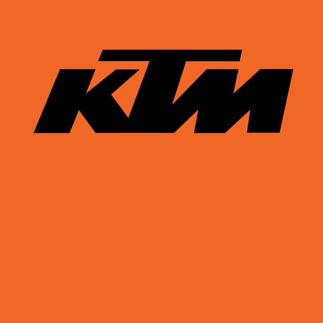 Pouring Motorex 15W-50 into engine showing KTM kit simplifies service