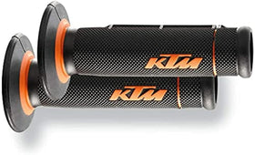 KTM grips installed on handlebar demonstrating secure fit on 22–28mm bars