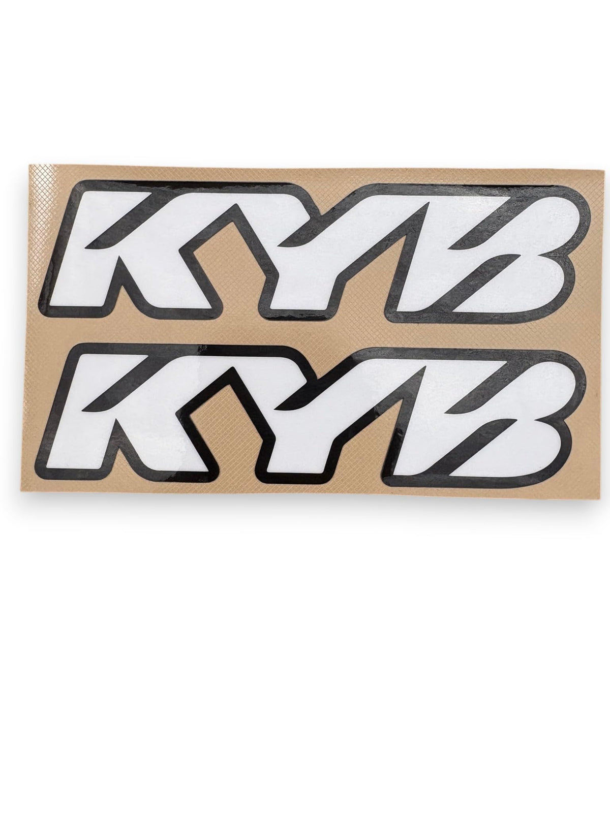 Generic KYB chrome stickers label close-up showing material and brand info