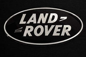 Land Rover emblem next to ruler demonstrating correct OEM size