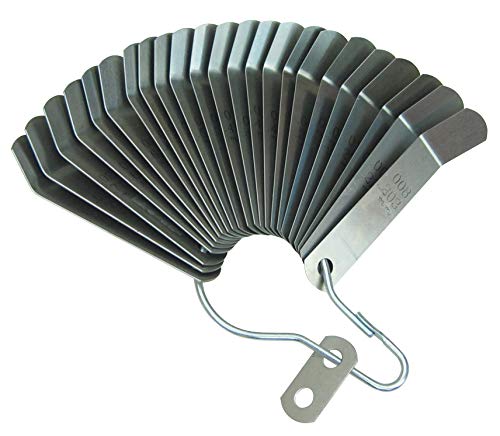 Lang Tools blade inserted during a valve adjustment demonstrating easier reach into recessed guides