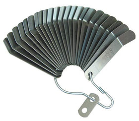 Lang Tools blade inserted during a valve adjustment demonstrating easier reach into recessed guides