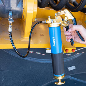 LANNIU grease gun in a workshop servicing machinery for efficient maintenance