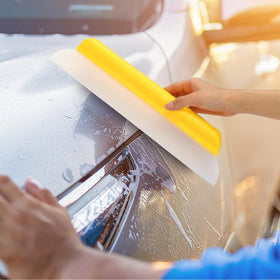 Lanties squeegee beside a ruler showing 14-inch blade length for wide coverage