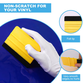 Lasnten smoothing a decal on a car window for bubble-free finish