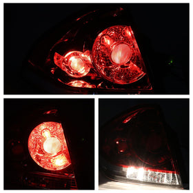 Lathsy tail light next to a hand for scale to confirm size fit