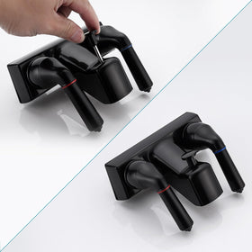 LavishStream faucet held in hand for scale showing lightweight ABS design and portability benefit