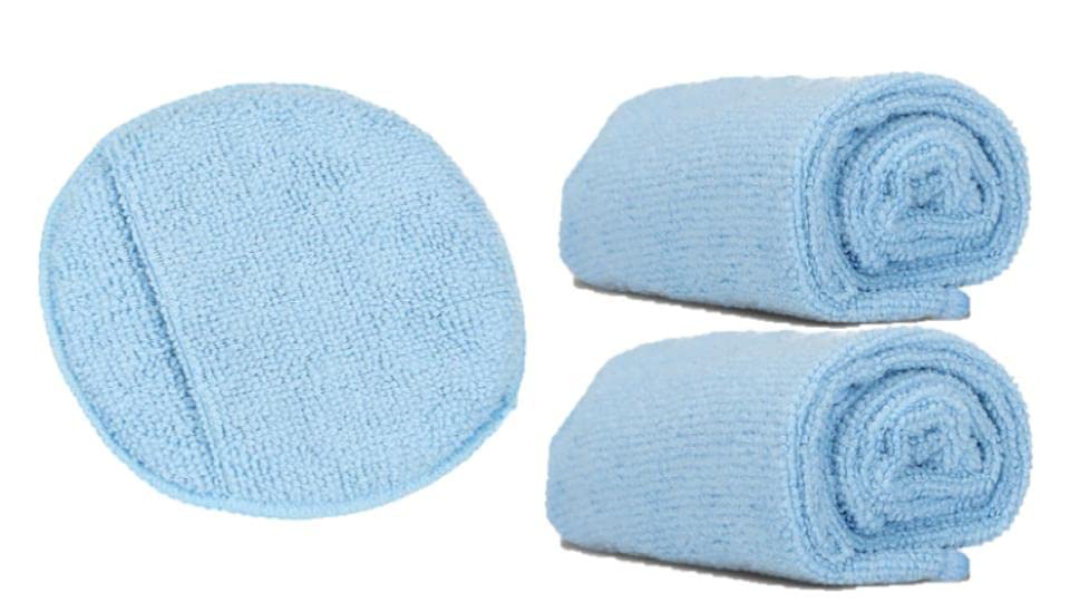 Leather CPR applicator front view showing round pad and finger pocket for secure grip