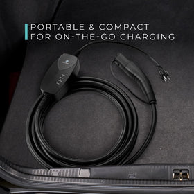 Lectron charger held in hand demonstrating portable, travel-friendly size