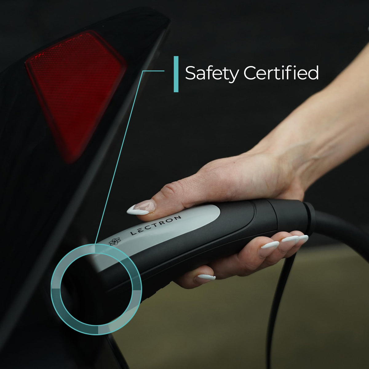 Lectron charging head connected to Tesla demonstrating seamless vehicle compatibility