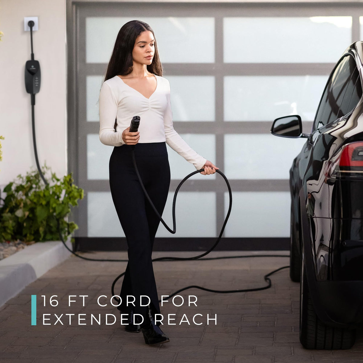 Lectron unit plugged into a Tesla showing convenient at-home charging