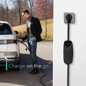 Lectron held in hand for scale illustrating portable, travel-ready size