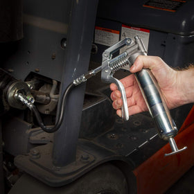 Legacy Manufacturing 4 inch rigid extension attached for precise, direct grease application
