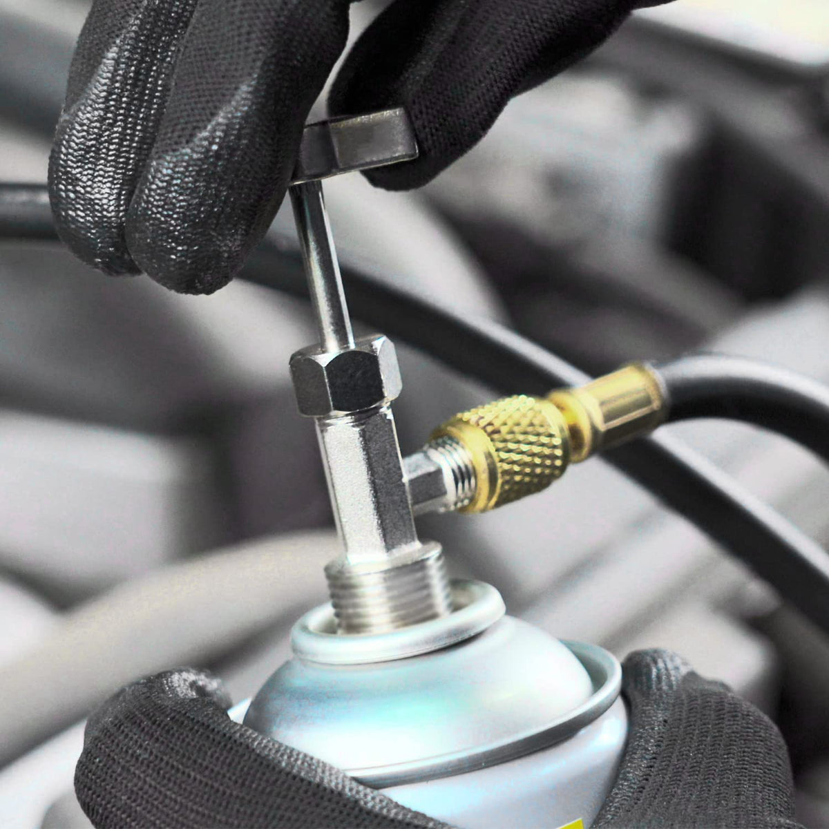 Lichamp in use vehicle ac service demonstrating easy refrigerant recharge access