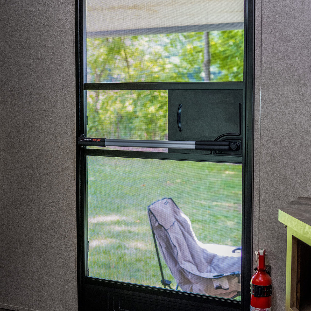 Lippert Screen Assist on an RV at campsite illustrating safer, smoother exits