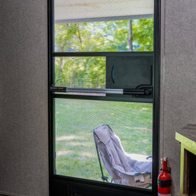 Lippert Screen Assist on an RV at campsite illustrating safer, smoother exits